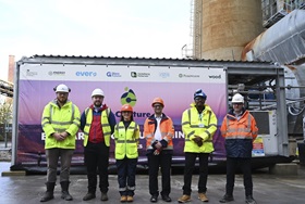 C-Capture’s Project Manager, Claudia Hernandez and XLR8 CCS project partners at the CCSCU which has been deployed at Pilkington UK’s site in St Helens, UK, to trial C-Capture’s carbon capture technology in the glass manufacturing industry.